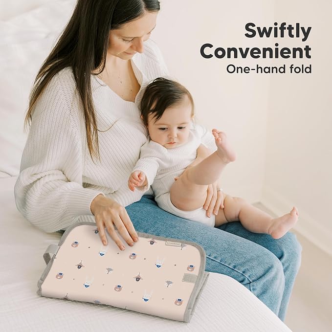 KeaBabies Portable Diaper Changing Pad, Easy Wipe Clean - Foldable Waterproof Baby Changing Mat for Diaper Bag, Compact, Lightweight, 25x13 Newborn, Infant, Baby Changer Travel Essential (Wild Patrol)