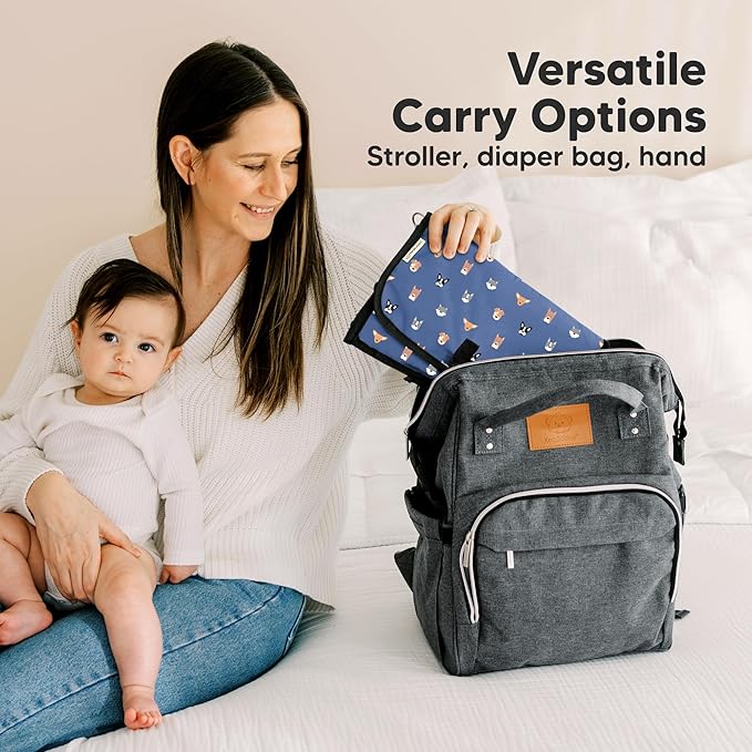 KeaBabies Portable Diaper Changing Pad - Large Waterproof Baby Changing Mat, Compact Travel Diaper Clutch, Functional Pockets Fit Newborn Essentials, Wipeable & Padded Baby Changer (Pets & Paws)