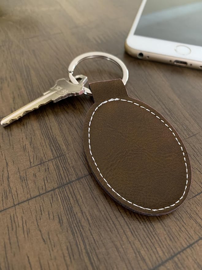 LaserGram Oval Keychain, Golfer Golfing, Personalized Engraving Included (Rustic with Silver)