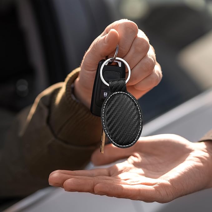 LaserGram Oval Keychain, Golfer Golfing, Personalized Engraving Included (Carbon Fiber Black with Silver)