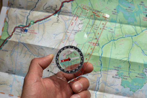 Coghlan's Deluxe Map Compass for Navigation, Orienteering, Hiking, Backpacking, Camping, and Outdoor Survival – Durable Design with Easy-to-Read Rotating Dial and Magnifying Viewer