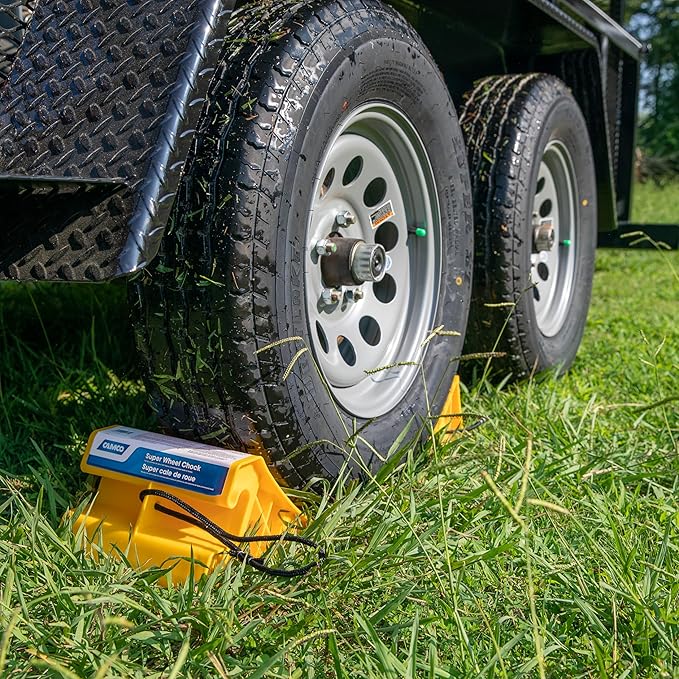 Camco Super Wheel Chock w/Rope - Large, Heavy Duty Trailer Wheel Chock Constructed of Durable Plastic - Features Rope Handle for Easy Removal - Use w/Tires Up to 29-inches – 44475
