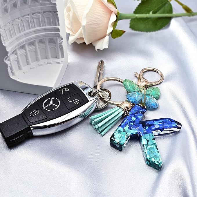 JINGUAZI Initial letter Keychains for Women Tassel Butterfly Pink Purple Cute Car Keychain for Wallet Backpack bag charm