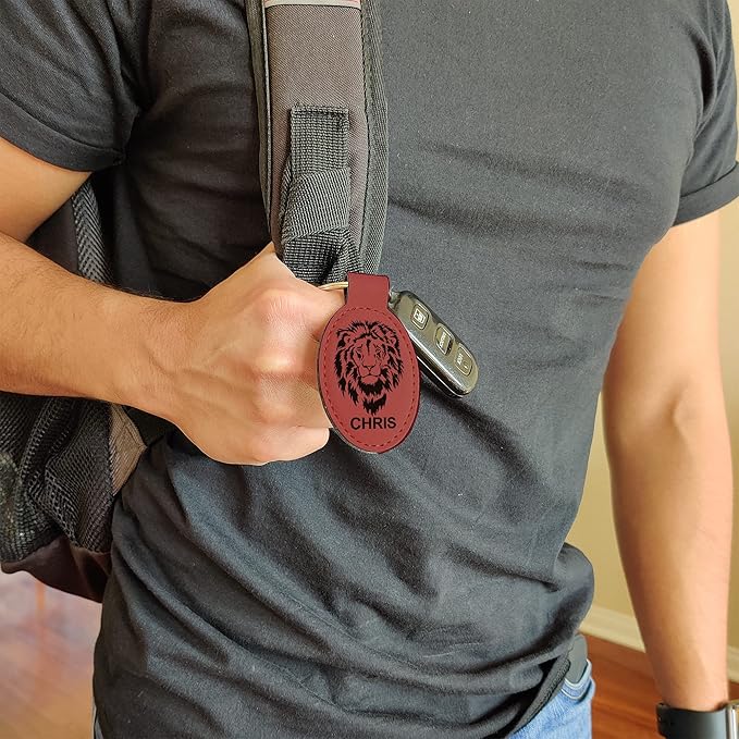 LaserGram Oval Keychain, Golfer Golfing, Personalized Engraving Included (Burgundy)